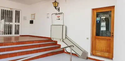 a staircase in a building with a door and a door at Dunas y Luz in Rota