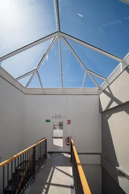 a skylight in an empty building with a staircase at Piso Torno in Sanlúcar de Barrameda