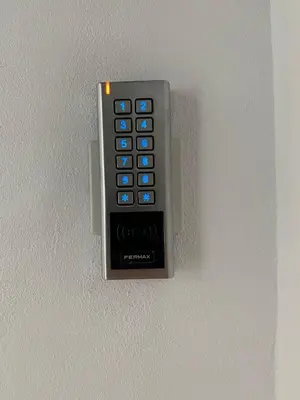 a remote control hanging on a wall at Anka Kurro in Rota
