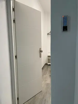 a door that is open to a room at Anka Kurro in Rota