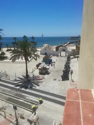 a person riding a skateboard on the beach at Apartamento en la Caleta in Cádiz