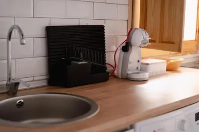 a kitchen counter with a hair dryer on a counter top at El Tablao in Jerez de la Frontera