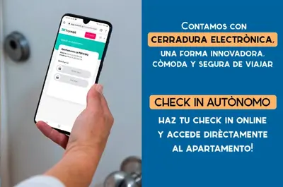 a person holding a cell phone in their hand at Atico del Buen CANTAOR by Cadiz4Rentals in Cádiz