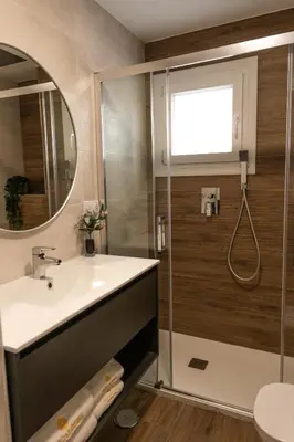 a bathroom with a sink and a shower at Mina50 by 7Escalones in Rota
