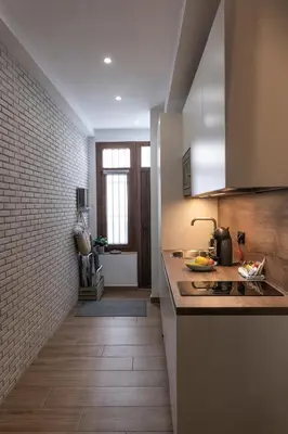 a kitchen with a sink and a counter top at Mina50 by 7Escalones in Rota