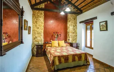 a bedroom with a bed in a room at Amazing Home In Arcos De La Frontera in Arcos de la Frontera