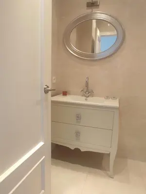 a bathroom with a sink and a mirror at Mirador Bajo de Guía in Sanlúcar de Barrameda