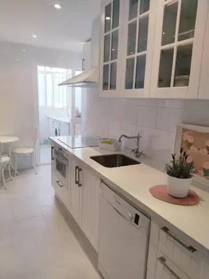 a kitchen with a sink and a counter top at Mirador Bajo de Guía in Sanlúcar de Barrameda
