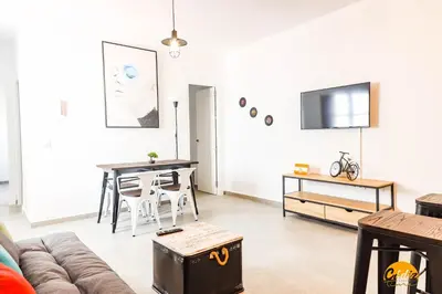 a living room with a couch and a table at Casa Rehala by Cadiz Time in Cádiz
