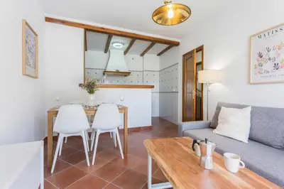 a living room with a couch and a table at Azvalia - Atarazana in El Puerto de Santa María
