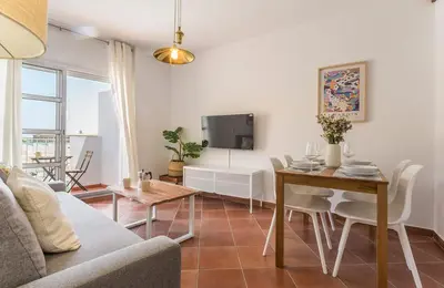 a living room with a couch and a table at Azvalia - Atarazana in El Puerto de Santa María