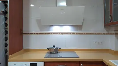 a kitchen counter with a pot on a stove at Sherryflat Laurel in Jerez de la Frontera