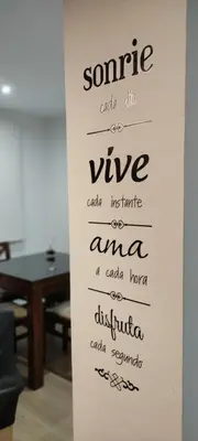 a sign with some wine written on a wall at El pisito Sanlúcar in Sanlúcar de Barrameda