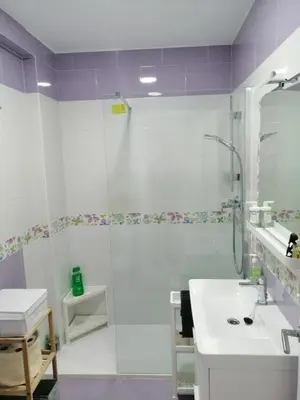 a bathroom with a shower and a sink at Hormaza Chiclana in Chiclana de la Frontera