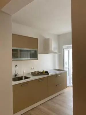 a kitchen with a sink and a counter top at MEDINA BLUE - CASITAS CON ENCANTO in Medina Sidonia