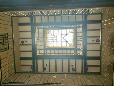 a window in a room with a brick wall at GATU Ringo in El Puerto de Santa María