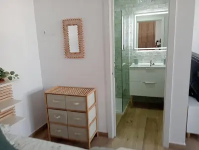 a bathroom with a sink and a mirror at Apartamento Mar I in San Fernando