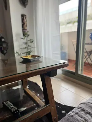 a table with a bowl of food on top of it at Quito in El Puerto de Santa María