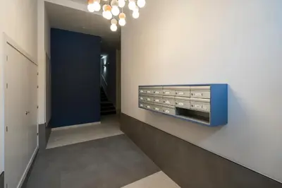 a hallway with a wall mounted audio system on a wall at Mistral playa la caleta Ascensor Grupo AC Gestion in Cádiz