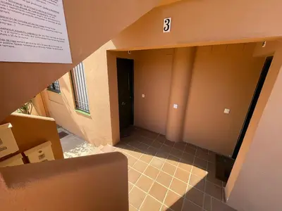 a view of a hallway in a building at Ático Amaranta in Chiclana de la Frontera