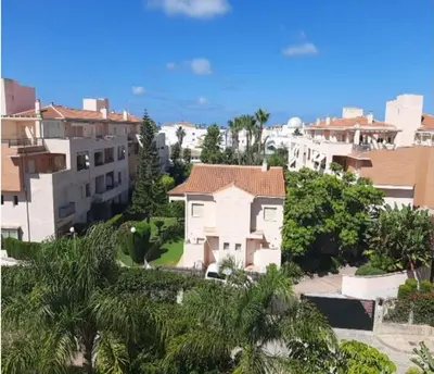 a view of a city with houses and trees at Ático en Costa Ballena con Barbacoa, Aire Acondicionado y WIFI in Costa Ballena