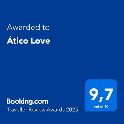 a blue screen with the text awarded to africa love at Ático Love in Jerez de la Frontera