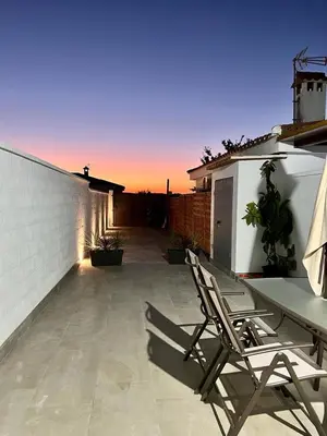 a living room with a table and a couch at Alojamiento Rural Buenavista in Arcos de la Frontera
