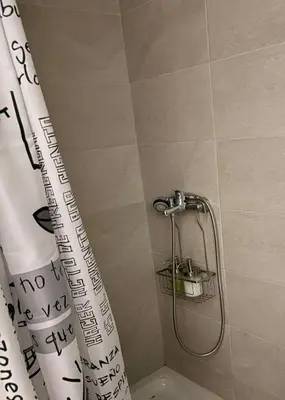 a shower in a bathroom with a shower curtain at Estudio Soniquete in Jerez de la Frontera