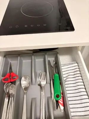 a drawer filled with utensils in a refrigerator at Estudio Soniquete in Jerez de la Frontera