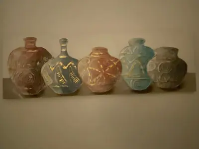 a group of vases sitting on a shelf at Estudio Soniquete in Jerez de la Frontera