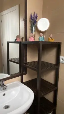a bathroom with a sink and a mirror at Hope's ático-apartamento in Cádiz