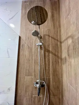 a shower with a shower head in a bathroom at GATU PREMIUM Villa La Pepa in Cádiz