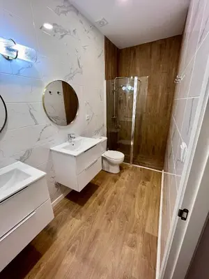 a bathroom with a toilet and a sink and a shower at GATU PREMIUM Villa La Pepa in Cádiz