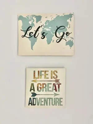 two pictures of a world map and a sign that says life is a great adventure at Texas Life Apartamento Centro Jerez in Jerez de la Frontera