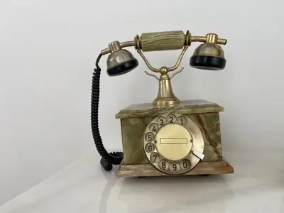 an old fashioned telephone with two lights on it at Azvalia - Puro Puerto Casco Histórico in El Puerto de Santa María