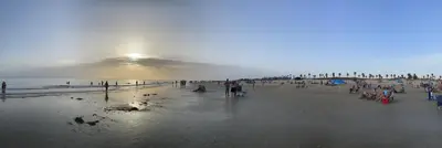 a large group of people on a beach at Hochwertiges Haus in wunderschöner Golf Anlage am Meer in Rota