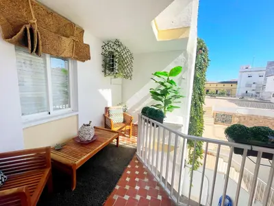 a balcony with a bench and a window at Eva Recommends Francos in Jerez de la Frontera