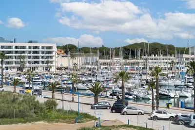 a bunch of boats parked in a marina at Apartamento Puerto Sherry in El Puerto de Santa María