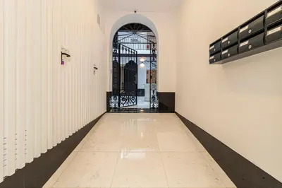 an empty hallway with a gate in a building at Allo Apartments San Roque Bajo A in Cádiz