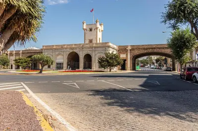 a building with a clock tower on top of it at Allo Apartments San Roque Bajo A in Cádiz
