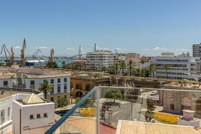 a view of a city from a balcony at Allo Apartments San Roque 1ºA in Cádiz