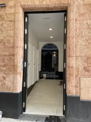 a hallway leading into a building with a doorway at Allo Apartments San Roque Bajo B in Cádiz