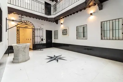 a room with a white floor with a star on it at Allo Apartments San Roque 2ºA in Cádiz
