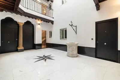 a room with a star on the floor at Allo Apartments San Roque 2ºC in Cádiz