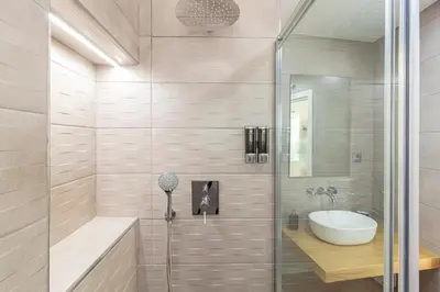 a bathroom with a shower and a sink at Allo Apartments San Roque 3ºB in Cádiz