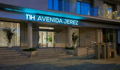 a building with a sign that reads miami avida jezez at NH Avenida Jerez in Jerez de la Frontera