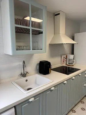 a kitchen with a sink and a counter top at Gran casa con balcón para grupos en centro histórico in El Puerto de Santa María