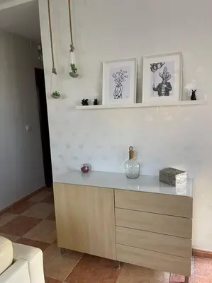 a kitchen with a counter with a vase on it at SlowHome Rota in Rota