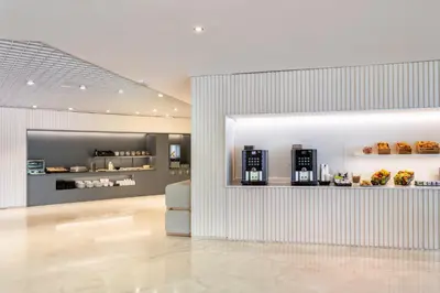 a lobby with aasteryasteryasteryasteryasteryasteryasteryasteryasteryasteryasteryastery at B&B HOTEL Jerez in Jerez de la Frontera