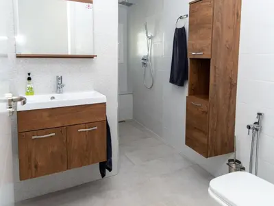 a kitchen with a stove and a refrigerator at GuestReady - Blanca Paloma Ana in El Puerto de Santa María